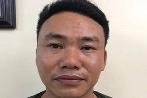 Nguyễn Mạnh Quân tại cơ quan điều tra. Ảnh: CACC