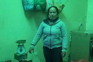 Bị can Nguyễn Thị Nguyệt bị công an bắt giữ. Ảnh: CA