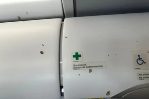 Máy bay dân sự Mỹ trúng đạn trên bầu trời Haiti