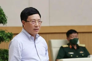 Phó Thủ tướng Thường trực Phạm Bình Minh, Chủ tịch Uỷ ban ATGT Quốc gia chủ trì Hội nghị. Ảnh: TTXVN