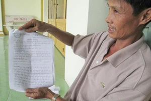 Sấy lúa làm bụi bốc mù mịt