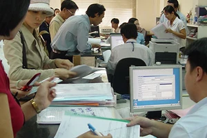 Đầu tư kẹt trong hệ thống giấy tờ lỗi thời