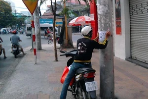 TP.HCM sẽ xử phạt người phát tờ rơi 