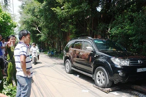 Đình chỉ điều tra vụ cặp đôi chết với 10 phát đạn trong ô tô