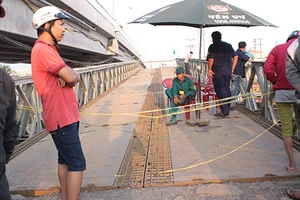 Qua cầu đang tháo dỡ, cô gái mất tích