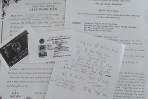 Vợ một công an gán thẻ giả của chồng vay tiền tỉ