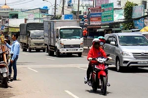 Nâng cao quốc lộ 13 cũ lên 2 m có phí tiền?