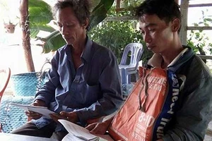 Phục hồi sinh hoạt Đảng cho hai nông dân ‘nhận hối lộ’