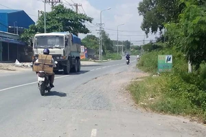 Vướng đất dân, 15 năm chưa xong 150 m đường