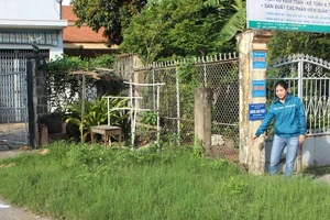 Xây hàng rào cũng phải xin phép thành phố?