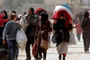 Di tản 12.500 người khỏi vùng chiến sự Đông Ghouta