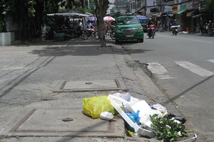 Bỏ rác vào miệng cống: Phạt đến 7 triệu đồng!