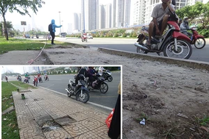 Đập bỏ vật nhọn nguy hiểm trên xa lộ Hà Nội