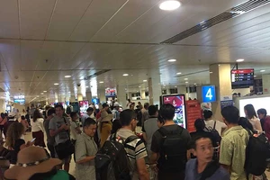 Vé máy bay Tết giá rẻ hết, hạng thương gia còn