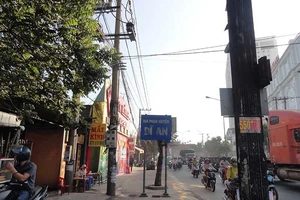 Đã tháo bảng chỉ dẫn huyện Dĩ An