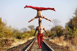 Người cha nghiêm khắc của hai kỷ lục gia