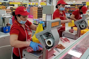 Doanh nghiệp lớn tìm cách giảm giá thịt heo