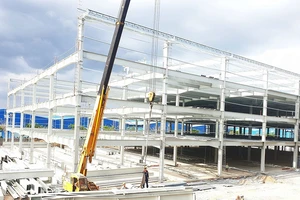 Mua bán, sáp nhập bất động sản vẫn ‘xôm tụ’