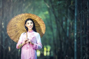 Ðộc đáo áo dài Tết năm Sửu