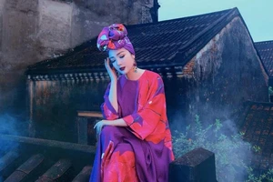 Gỡ hình ảnh hoa hậu Giáng My chụp ảnh trên nóc nhà cổ ở Hội An 