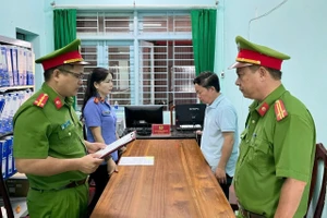 Tổng Giám đốc Công ty CP Tài chính và Phát triển Năng lượng Lê Quang Hào bị bắt. Ảnh: CA