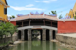 Hội An sẽ khen đơn vị thi công trùng tu di tích Chùa Cầu. Ảnh: TN