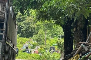 Phát hiện 1 thi thể trong nghĩa trang, cạnh xe máy cháy đen