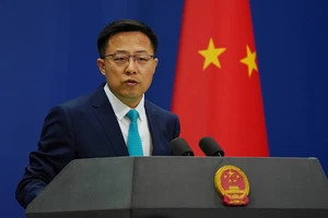 Trung Quốc nói Mỹ phải dỡ trừng phạt Nga để giải quyết khủng hoảng Ukraine