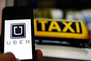 Hiệp hội Taxi Hà Nội kiến nghị dừng Uber, Grab 