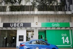 Sẽ điều trần thương vụ Grab mua Uber