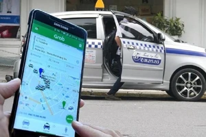 Grab hoan nghênh taxi truyền thống chuyển sang mô hình Grab