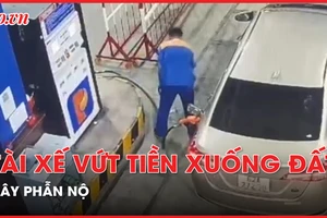 Tài xế vứt tiền xuống đất khi đổ xăng gây phẫn nộ ở Long An