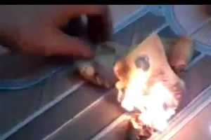 Việt Nam đề nghị Trung Quốc phối hợp xử lý du khách đốt tiền Việt