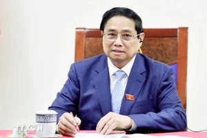 Thủ tướng Chính phủ Phạm Minh Chính điện đàm với Thủ tướng Singapore Lawrence Wong