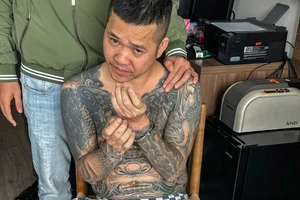 Hành trình vây bắt bị can có hình xăm con kỳ lân phủ kín cơ thể