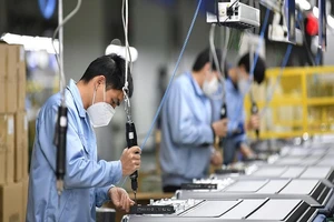 Các doanh nghiệp Trung Quốc quay trở lại sản xuất. Ảnh: TÂN HOA XÃ