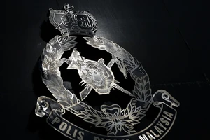 Cảnh sát Malaysia đang điều tra vụ rò rĩ thông tin mật về virus COVID-19. Ảnh: MALAY MAIL