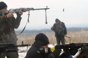 Binh sĩ Ukraine đồn trú ở khu vực Lugansk hồi năm 2015. Ảnh: BBC 