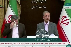 Thứ trưởng Bộ Y tế Iran Iraj Harirchi trong buổi họp báo ngày 24-2. Ảnh: ABAS ASLANI