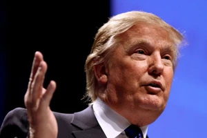 Tổng thống Donald Trump trong một cuộc họp báo tại Nhà Trắng hôm 14-2. Ảnh: AFP