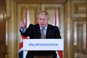 Thủ tướng Anh trong một cuộc họp báo về COVID-19 hồi tháng 3-2020. Ảnh: BBC