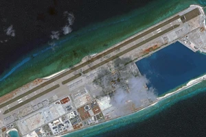 Hiện trạng quá trình bồi đắp trái phép của Trung Quốc ở khu vực Đá Chữ Thập (Ảnh chụp vào tháng 2). Ảnh: PLANET LABS 