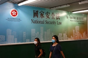 Một bản quảng cáo của chính quyền Hong Kong ủng hộ luật an ninh quốc gia do Trung Quốc ban hành. Ảnh: SCMP