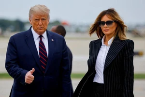 Tổng thống Mỹ Donald Trump cùng Đệ nhất phu nhân Melania Trump. Ảnh: REUTERS