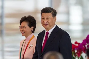 Bà Lâm Trịnh Nguyệt Nga và ông Tập Cận Bình. Ảnh: SHUTTERSTOCK