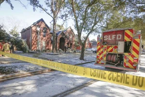 Căn nhà bà Jackie Pham Nguyen bị phong tỏa sau vụ hỏa hoạn hôm 16-2. Ảnh: HOUSTON CHRONICLE