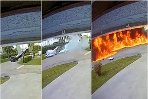 Hình ảnh cắt ra từ đoạn video quay lại vụ việc một chiếc máy bay rơi xuống chiếc xe hơi đang chạy trên đường.