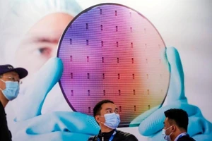 Cạnh tranh công nghệ Mỹ-Trung. Ảnh: REUTERS