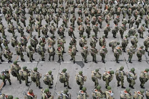 Nga bất ngờ ra lệnh rút quân khỏi biên giới Ukraine. Ảnh: REUTERS