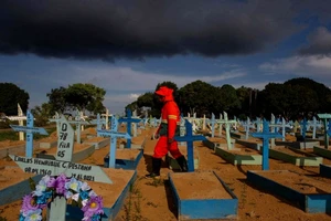 Gần 6,9 triệu người có thể đã tử vong vì COVID-19. Ảnh: AFP